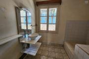 À vendre une villa à étage de type F5 avec mezzanine située à Ankadikely Ilafy sur un terrain de 663m2 bord de route goudronnée