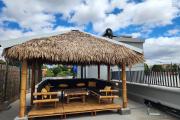 À louer un appartement meublé de standing type F3 avec rooftop privatif sise à Androhibe dans une résidence hautement sécurisée.