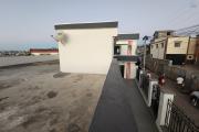 A VENDRE - UNE MAISON A ETAGE RENOVEE DE TYPE F9 BORD DE ROUTE PAVEE SITUEE A ANDRANORO AMBOHIBAO