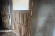 A VENDRE- Villa basse à terminer à Lohanosy Ambohijanaka Nord - porte coulissante entre living et la chambre